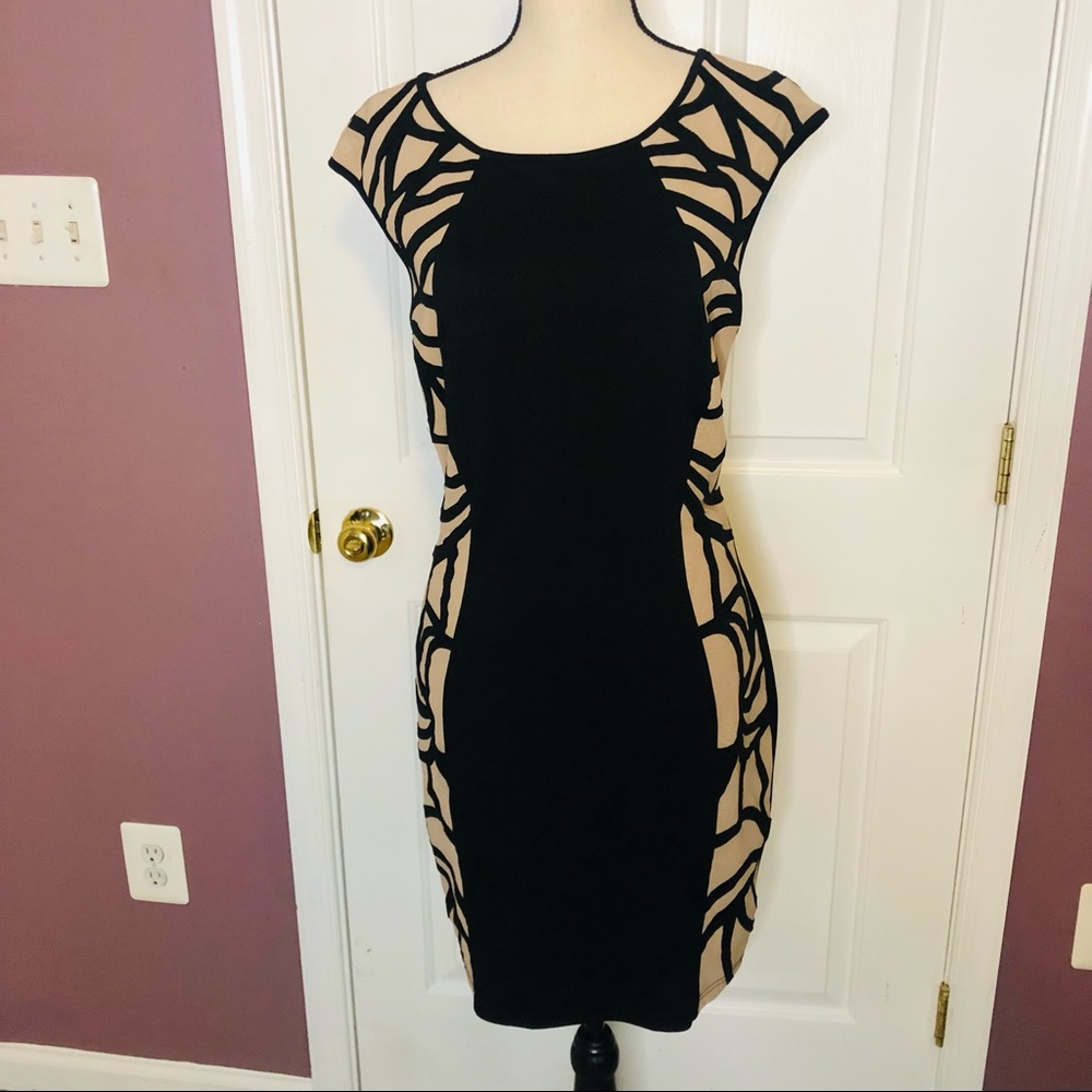 Black and nude dress with design on sides